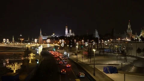 Kremlin and Red Square view at night from Soaring Bridge in Zaryadye Park Stock Footage 85327664