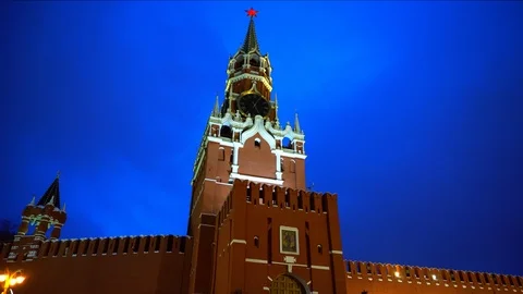Kremlin Clock or Kremlin Chimes, Kremlin wall, red star, close up, blue sky Stock Footage 102897692