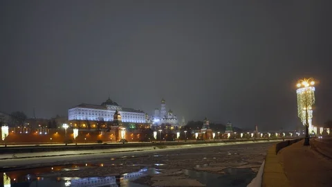Kremlin wall. Tower with red star on top. Moscow river covered with ice. Winter Stock Footage 116723282