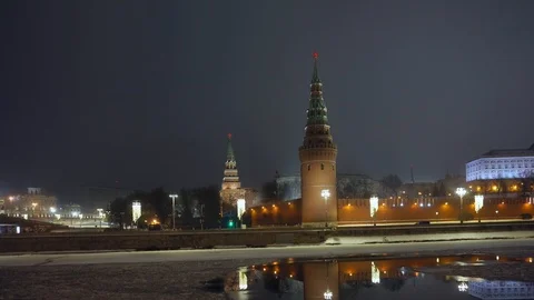 Kremlin wall. Tower with red star on top. Moscow river covered with ice. Winter Stock Footage 116724098