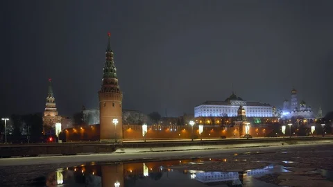 Kremlin wall. Tower with red star on top. Moscow river covered with ice. Winter Stock Footage 116724779