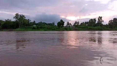 Krishna river evening scene before flood, huge water flow, people are enjoying.. Stock Footage 138326577
