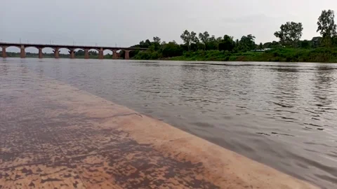 Krishna river, Krishna mai ghat at Sangli, Maharashtra, evening scene. Stock Footage 138521597