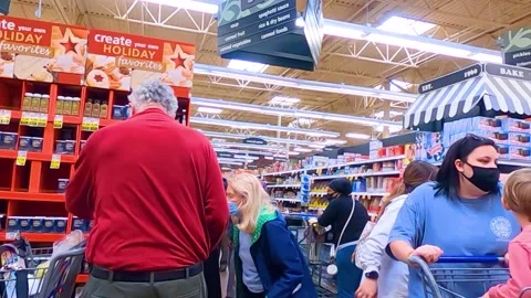 Kroger grocery store interior group of people wearing face masks back of stor Stock Footage 144014990