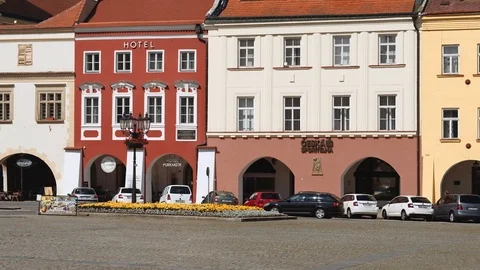 Kromeriz - Town square with historic buildings, people and traffic. 4K Stock Footage 113772638