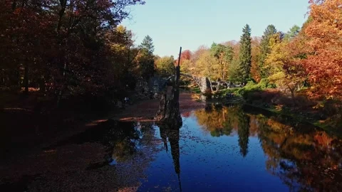 Kromlau, Devil's Bridge. Autumn scenery. Drone footag Stock Footage 234406257