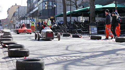 Kruisinki, the public racing on gravity-driven cars in Lappeenranta, Finland Stock Footage 108266373