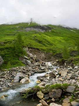 Krumlbach on a cloudy day in springtime Stock Photos
