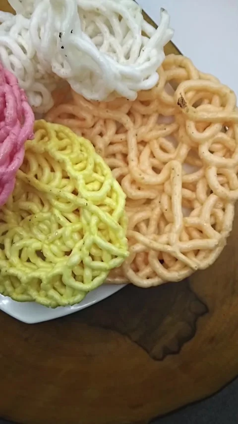 Krupuk, deep fried crackers from tapioca starch popular in Suriname. Stock Footage 295293439