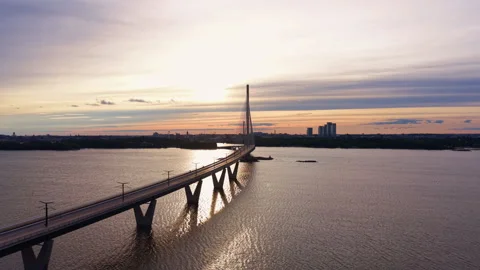 Kruunuvuorensilta cable-stayed bridge stretches across Helsinki bay at sunset 库存影片 341306371