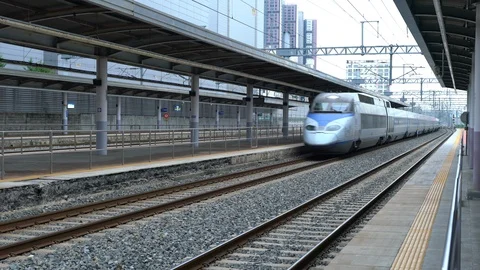 KTX bullet train passing at high speed at Daegu station in South Korea Stock Footage 119809304