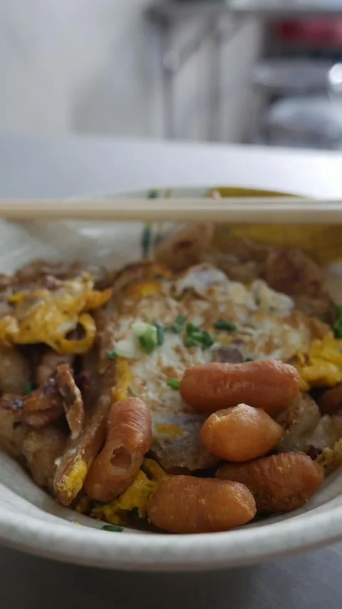 Kua Kai Thai Stir Fried Chicken with Egg and noodle Stock Footage 327574792