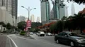 Kuala Lumpur 007 Street in Kuala Lumpur City Center, view to Petronas Twin Tower HD Footage