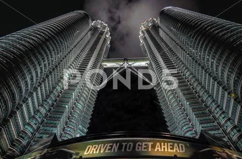 Kuala lumpur - april 10: general view of petronas twin towers at night Stock Photos