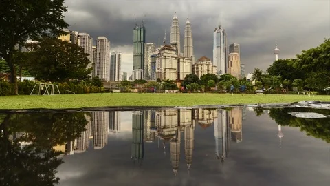 Kuala Lumpur city dramatic rain clouds from day to night, sunset time lapse Stock Footage 84066890