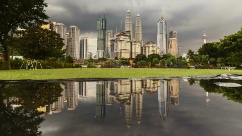 Kuala Lumpur city dramatic rain clouds from day to night, sunset time lapse Video stock 84067186