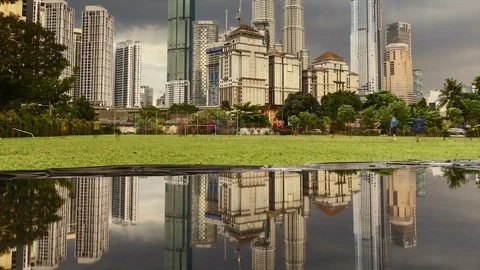 Kuala Lumpur city dramatic rain clouds from day to night, sunset time lapse Stock Footage 84067253