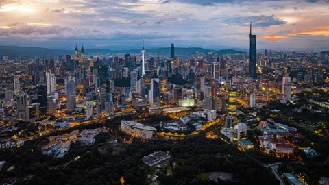 Kuala Lumpur city skyline with dramatic sky , twilight scene . Malaysia . Stock Footage 251160102