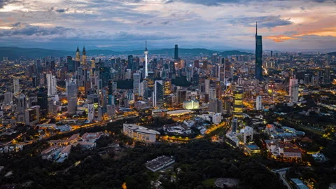 Kuala Lumpur city skyline with dramatic sky , twilight scene . Malaysia . Stock Footage 251160103