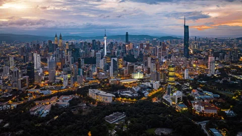 Kuala Lumpur city skyline with dramatic sky , twilight scene . Malaysia . Stock Footage 251160106