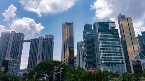 Kuala Lumpur Hyperlapse of Modern Cityscape with Skyscrapers and Moving Clouds Stock Footage 343154244