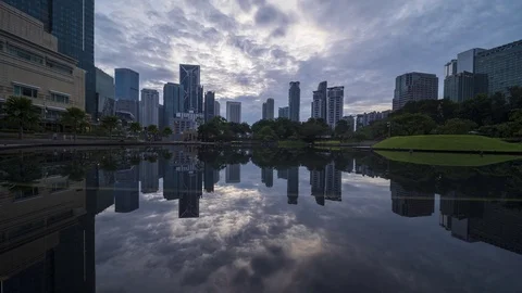 Kuala Lumpur landmark with reflection time lapse during sunrise. Stock Footage 104930339