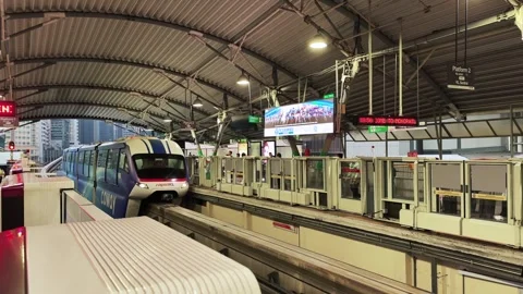 Kuala Lumpur, Malaysia - April 20, 2026: KL Monorail Platform 2 with Approaching Stockbeeldmateriaal 340180153