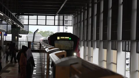 Kuala Lumpur MRT Yellow Line Train Arrives in Underground Station Stock Footage 332790684