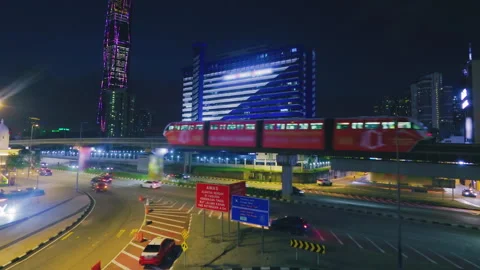 Kuala Lumpur Night Traffic with a Passing Elevated Train Stock Footage 344442183