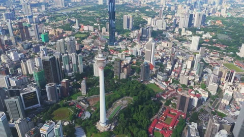Kuala Lumpur Tower with Merdeka 118 and the city skyline under clear sky Stock Footage 327124802