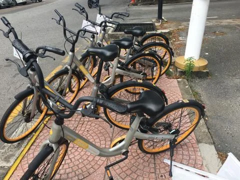 KUALA TERENGGANU, MALAYSIA - DECEMBER 30th, 2017. O Bike is easy access publi Stock Photos