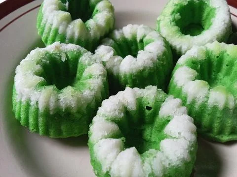 Kue putu ayu originates from Java, specifically Central Java.  Stock Photos