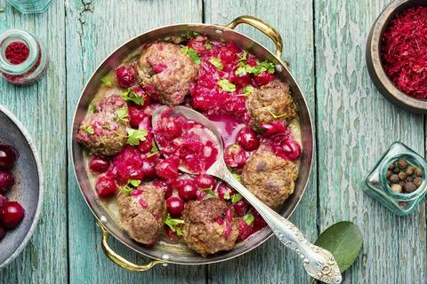 Kufta in cherry sauce Stock Photos