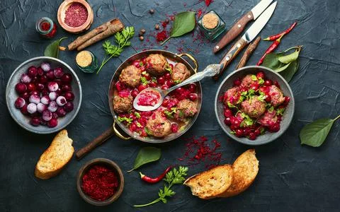 Kufta in cherry sauce Stock Photos