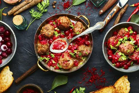 Kufta in cherry sauce Stock Photos