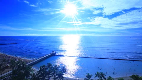 Kuhio Beach, the Breakwater, and the Rays of Sunshine Stock Footage 330215286