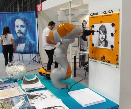 KUKA robot drawing Stock Photos
