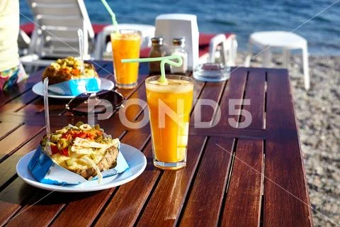 Kumpir and juice in Cafe Stock Photos