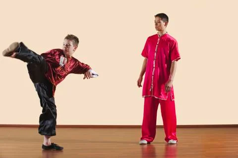 Kung Fu, Changquan, Ce chuai, Long Fist Style, Kung fu instructor and boy Stock Photos