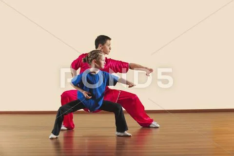Kung Fu, Changquan, Mabu anzhang, Long Fist Style, Kung Fu instructor and girl Stock Photos