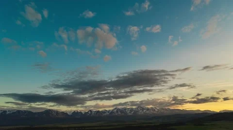 Kurai steppe and North Chuya ridge at the dawn. Clouds and Mountains Stock Footage 66483130