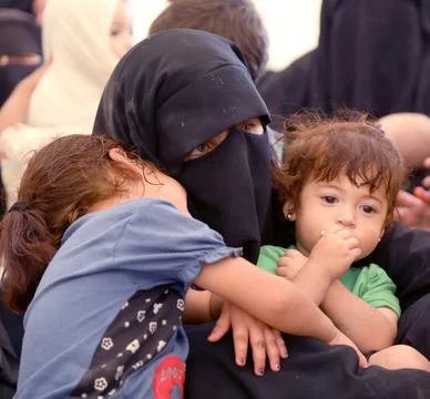 Kurdish authorities handing over 800 Syrian women and children to families from  Stock Photos
