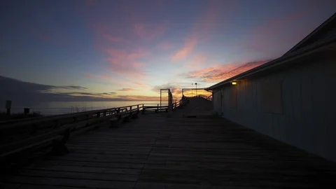 Kure beach pier dawn 11 Stock Footage 99281726