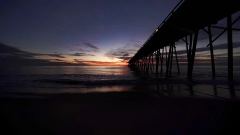 Kure beach pier dawn 5 Stock Footage 99281486