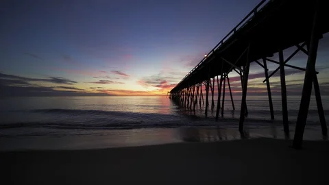 Kure beach pier dawn 9 Stock Footage 99281683