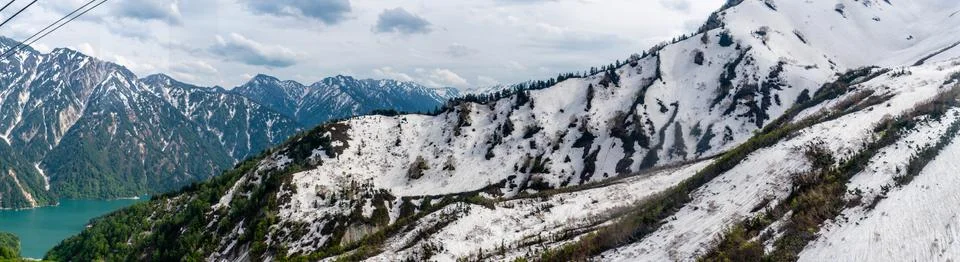 Kurobe snow mountain range Stock Photos