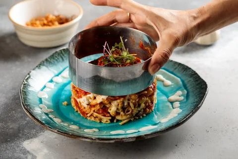 Kushari served in dish isolated on table top view of arabic breakfast 库存照片