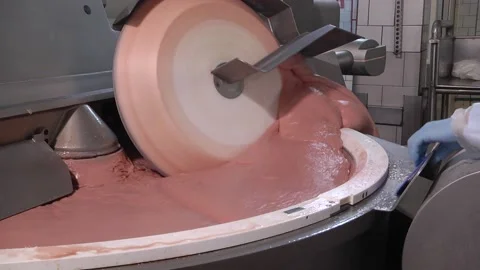 KUTTER FOR MEAT.  Fine grinding of soft meat raw materials Stock Footage 99490491