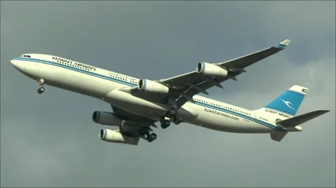 Kuwait Airways Airbus A340 on final approach to London Heathrow Airport, UK. Stock Footage