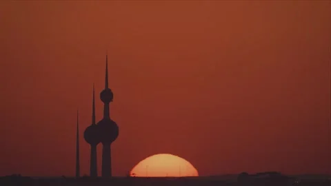 Kuwait City, Kuwait - [19 June 26 ]: The Kuwait Towers silhouetted against a Stock Footage 340310706